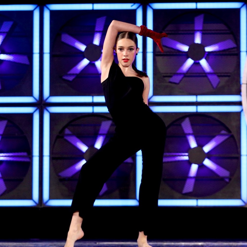 One shoulder one piece jumpsuit dance costume. Nice crepe material.